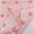 Tissu de flanelle tricoté en polyester rose élégant de fleurs coupées
